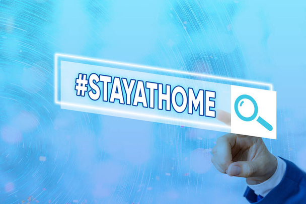 Konzeptionelle Handschrift mit dem Hashtag Stay at home. Business-Foto zeigt ein Trend-Label in den sozialen Medien im Zusammenhang mit dem Coronvirus-Ausbruch Web-Suche digitalen futuristischen Technologie-Netzwerk - Foto, Bild