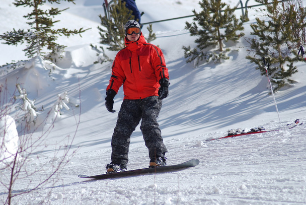 A snowboarder - Фото, изображение