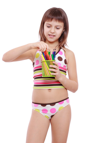 Little girl holding colorful pencils - Foto, Imagem