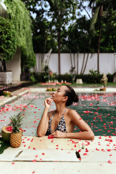 Beautiful female in swimming pool background - Foto, Imagem
