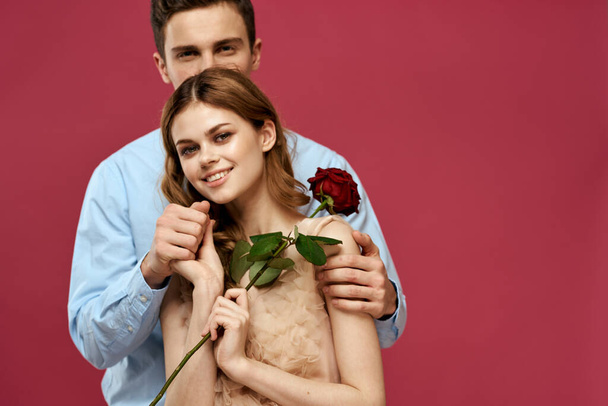 married couple man and woman romance red rose isolated background holiday flowers - Foto, Imagen
