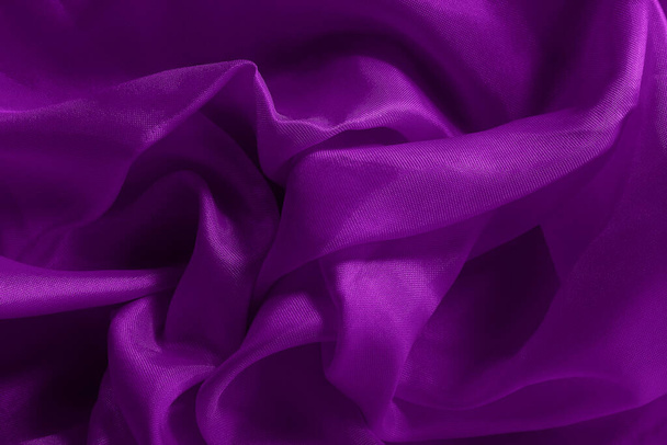 темно-фиолетовая ткань ткань текстуры для фона и дизайна художественных работ, красивые скомканные узоры из шелка или льна. - Фото, изображение