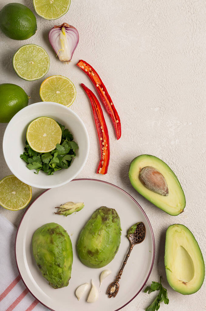 Ingredients for Mexican Sauce Guacamole cooking background. - Photo, Image
