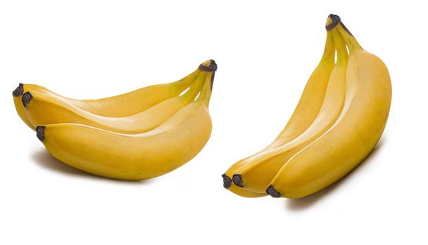Bananas maduras e fatias de banana isoladas em fundo branco - Foto, Imagem