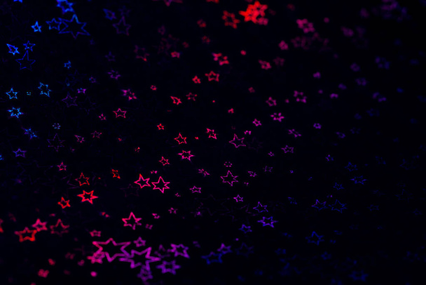 rote holographische Sterne abstrakt gemusterter Hintergrund - Foto, Bild