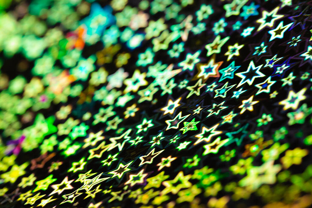 groene holografische sterren abstract patroon achtergrond - Foto, afbeelding