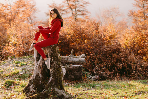woman relax in autumn forest - Photo, Image