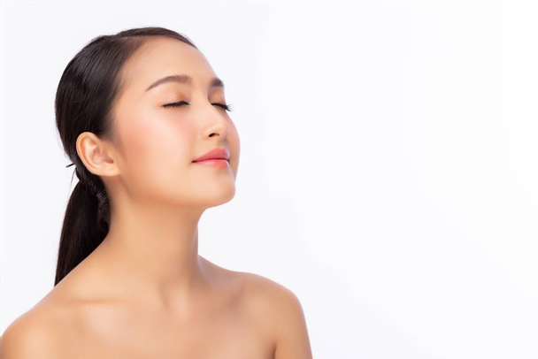 Beautiful young asian woman with clean fresh skin, closed eyes. Female beauty face care. bear shoulder. Glamour girl has beauty facial skin. Facial treatment, skin care and beauty skin concept  - Fotografie, Obrázek