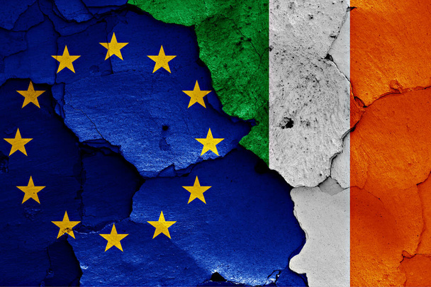 flags of EU and Ireland painted on cracked wall - Photo, Image