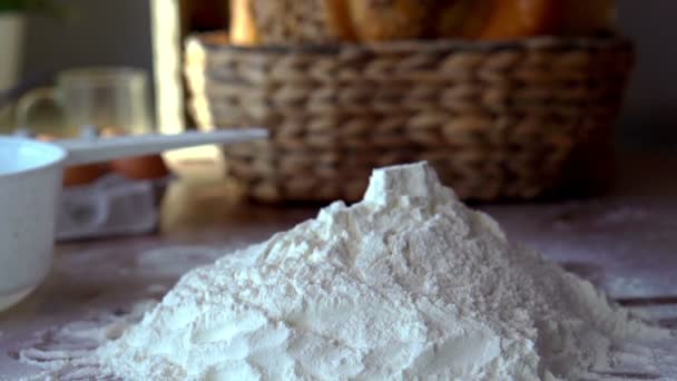 Butter falling into heap of flour - Felvétel, videó