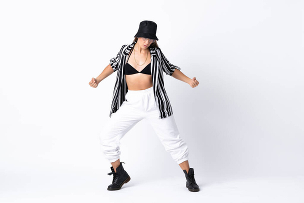 Woman dancing over isolated white background - Photo, image