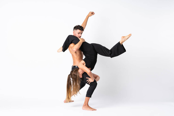 Couple dancing over isolated white background - Fotoğraf, Görsel