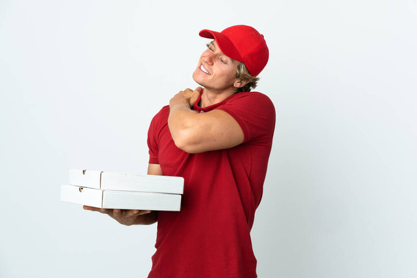 pizza consegna uomo su sfondo bianco isolato che soffre di dolore alla spalla per aver fatto uno sforzo - Foto, immagini