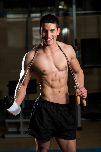 Handsome Muscular Men With Jumping Rope - Foto, immagini