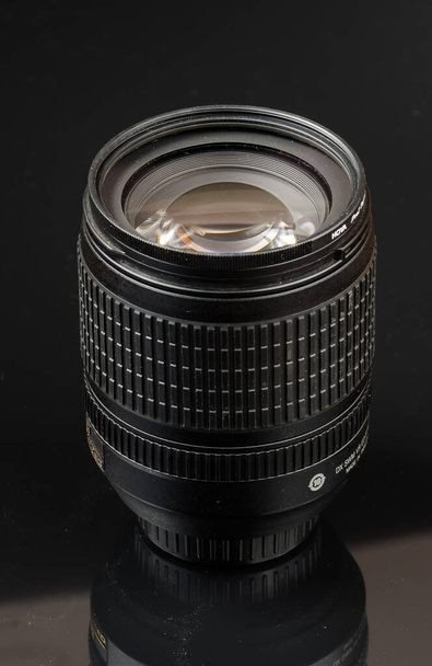 studio, product image, SLR lens on a black background - Photo, Image
