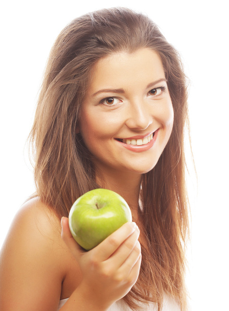 Happy woman with green apple - Valokuva, kuva