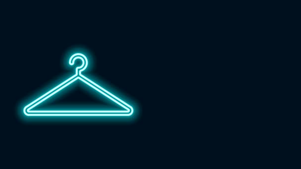 Zářící neonová čára Visací skříň ikona izolované na černém pozadí. Ikona šatny. Symbol služby oblečení. Věšák na prádlo. Grafická animace pohybu videa 4K - Záběry, video