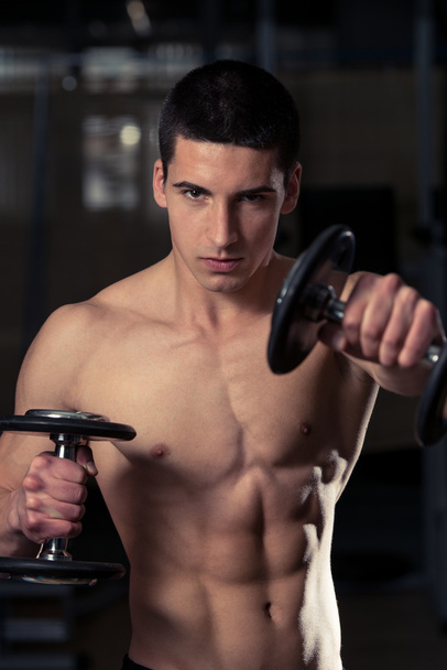 Young Athlete Exercise Power Boxing With Dumbbells - Foto, imagen