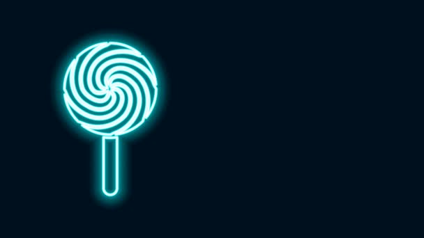 Glowing neon line Lollipop icon isolated on black background. Food, delicious symbol. 4K Video motion graphic animation - Footage, Video