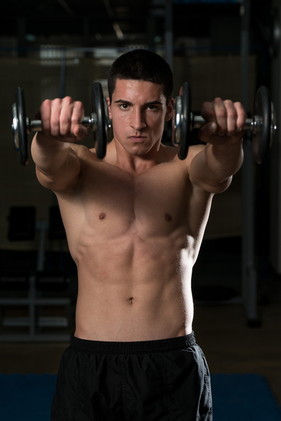 Young Athlete Exercise Power Boxing With Dumbbells - Foto, Imagen