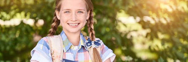 Beautiful american portrait of schoolgirl. Preschool kid. Little happy girl - Foto, Imagem