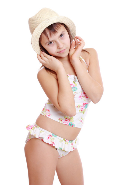 Girl in swimsuit and straw hat - Фото, зображення