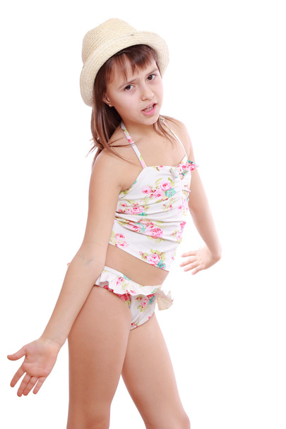 Girl in swimsuit and straw hat - Foto, Imagen