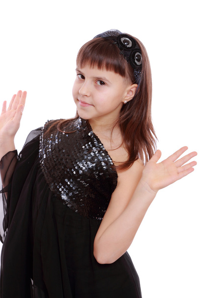 Young girl in a black dress - Фото, зображення