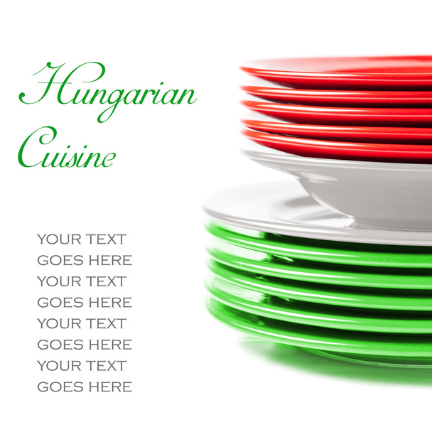 Stack of colorful ceramics plates in Hungarian colors - Photo, Image