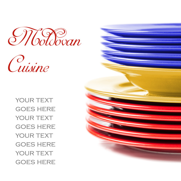Stack of colorful ceramics plates in Moldovan colors - Photo, Image