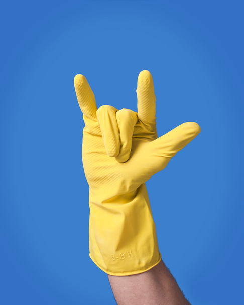 Rock auf Latex-Handschuh - Foto, Bild