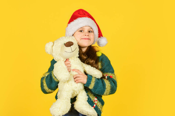 Small girl hold teddy bear toy. Christmas gift. Teddy bear improve psychological well being. Kid little girl play toy teddy bear. Simple happiness. Happy childhood. Toys shop. Cute plush friend - Fotoğraf, Görsel