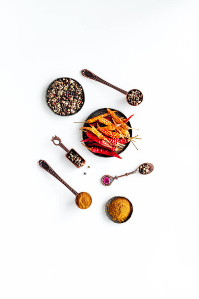 A set of fragrant hot spices - pepper and paprika with herbs, top view - Foto, Imagem