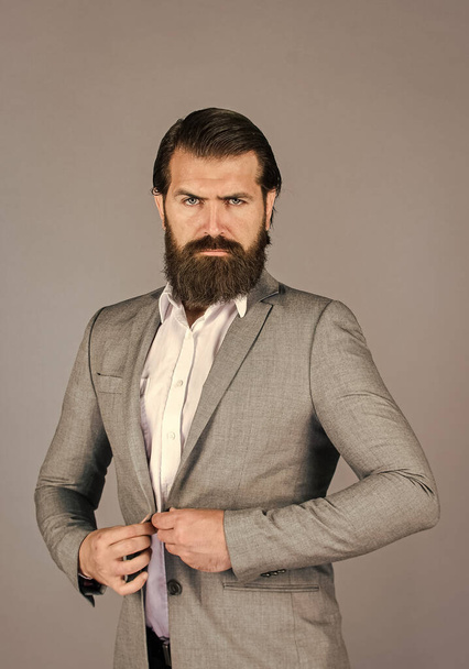 male beauty and fashion. businessman with perfect beard and moustache. real boss in jacket. mature man has serious look. confidence and charisma. handsome man wear office suit. Glamour fashion model - Foto, immagini