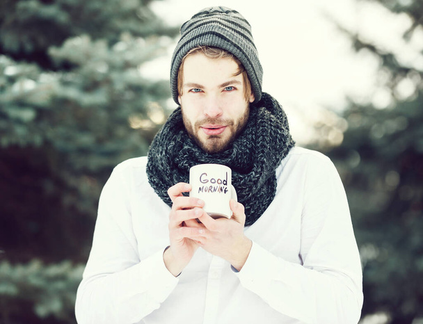 handsome man with morning cup in winter outdoor - Zdjęcie, obraz