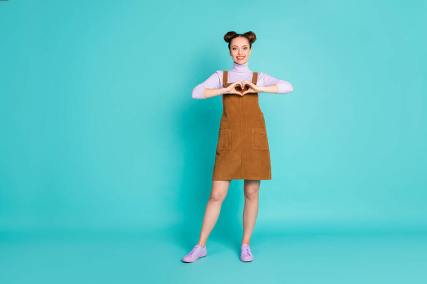 Full body photo of attractive charming pretty two lovely buns hairdo lady person show arms healthy heart wear purple pullover sneakers velvet brown dress isolated turquoise color background - Foto, Imagem