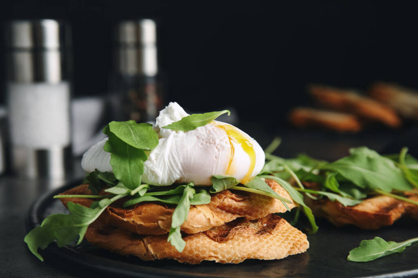 Delicious sandwich with arugula and egg on table, closeup - Photo, Image