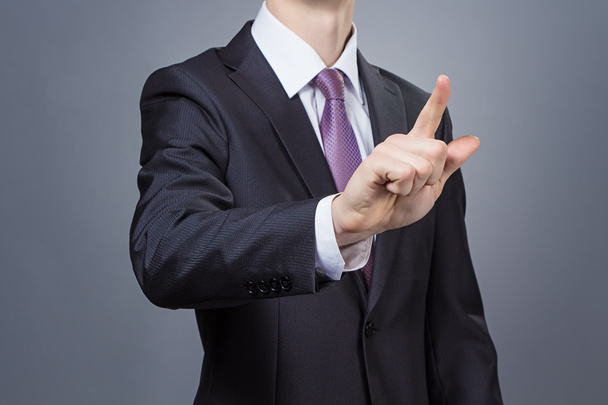 Businessman pointing his finger - Fotó, kép
