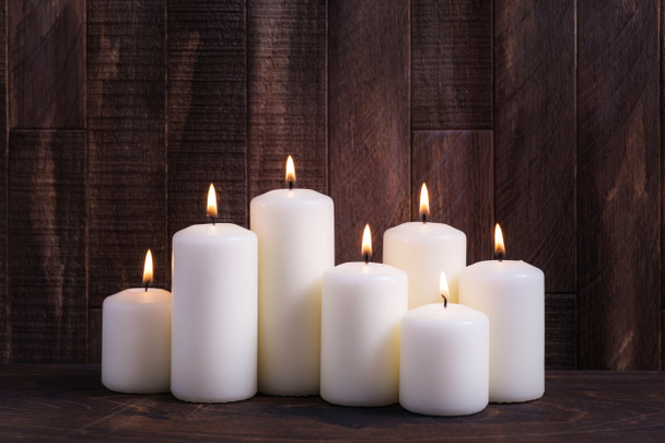 Christmas background burning candles wiht copy space for holiday greetings - Photo, Image