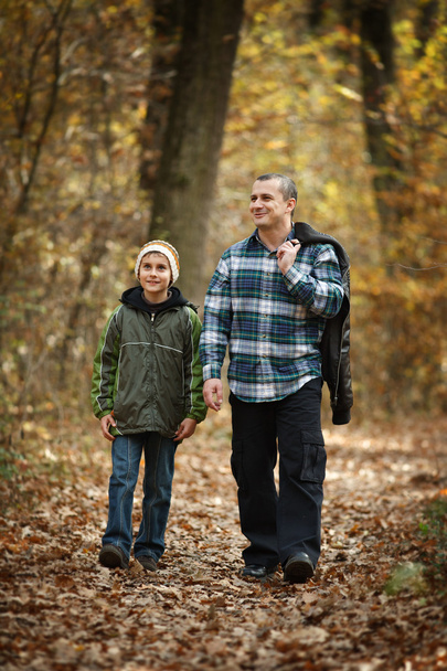 Father and son taking a walk outdoor - Photo, Image