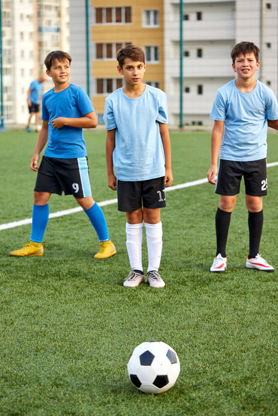 young footballers on football match in stadium - Zdjęcie, obraz