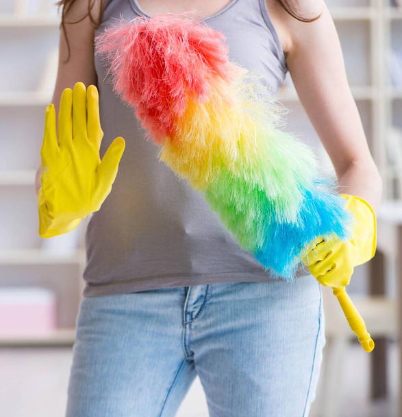 Woman doing cleaning at home - Фото, изображение
