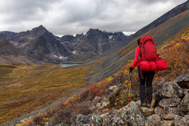 Woman Backpacking on Scenic Rocky Hiking Trail - Photo, Image