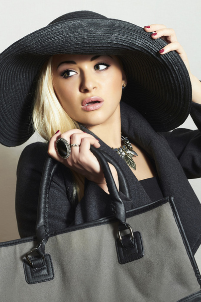Beautiful Blond Woman in Hat.Beauty Girl with Handbag.Shopping - Photo, Image