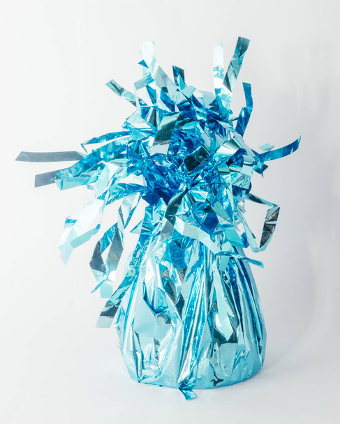 gift candy in a blue wrapper, on a white background - Zdjęcie, obraz