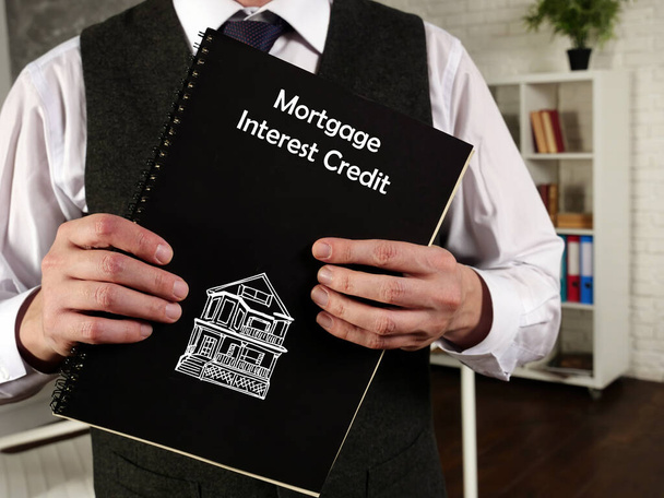 Finanční koncepce o hypotečním úvěru s nápisem na kusu papíru - Fotografie, Obrázek