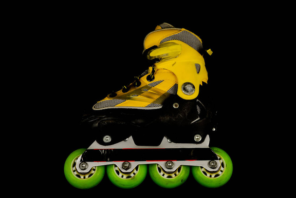 Inline vintage colored plastic skating skate boot - Photo, Image