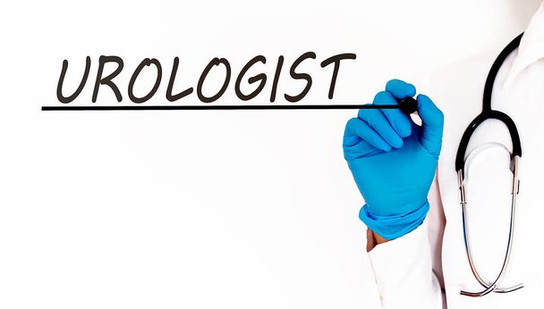 Doutor escrevendo texto UROLOGISTA Conceito médico sobre fundo branco - Foto, Imagem