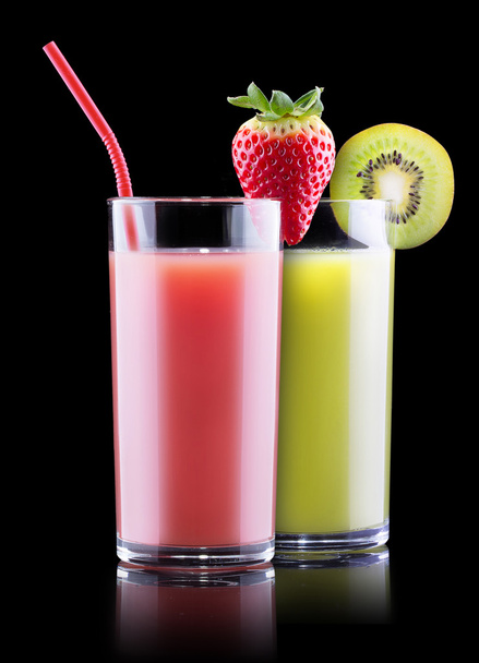 Tasty summer fruits with juice in glass - Foto, afbeelding