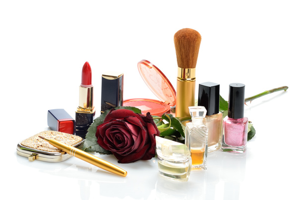 Items for decorative cosmetics makeup, jewelry, mirror and red flower - Photo, Image